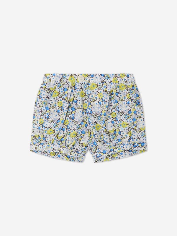 Introducing the Baby Girls Short Square Floral Shorts in Blue, a magnificently chic addition to your little girl's closet. Perfect for enhancing her charm in any setting. The key attributes that distinguish this piece are: Exquisite Design: adorned with a trendy and whimsical print, this unique piece instantly adds a pop of colour and style.  Premium Comfort: Made from superior quality materials, offering optimal comfort for your baby girl throughout the day.  Chic Appeal: Elevate your baby's fashion quotient with these lovely floral Bonpoint shorts. Grab them today and let your princess captivate every heart with her irresistible charm!