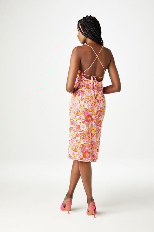 Our Sahara Slip Midi Dress featuring cowl neckline is the perfect look this summer. Team with strappy heels for summertime glam! Model is 5'9 and wears a size 8.