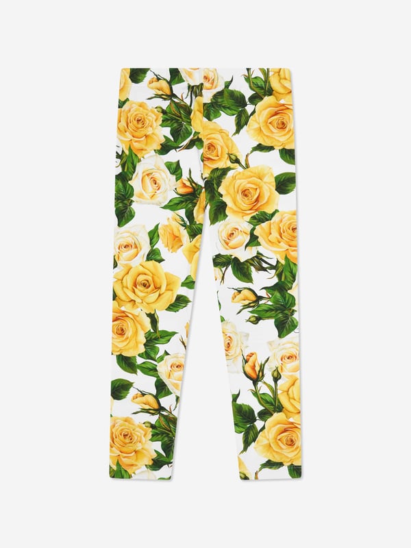 Dolce  Gabbana incorporate innovative materials with vintage abstracts into coexisting spaces. These girls rose leggings capture the Italian label's mesmeric craftsmanship and purity of design. As part of the girl‚ flowering collection, each piece is depicted in a veritable riot of yellow roses. Presented as interlock leggings with all-over yellow rose print. She will look and feel divine.  Made in Italy Multi-Coloured Regular Fit Stretch Waistband Placed Print Inner Leg: 47cm on Size 6 Years Hem: 10cm on Size 6 Years Print Placement Will Vary Due to  Aspect  External Composition: 90% Cotton, 10% Spandex