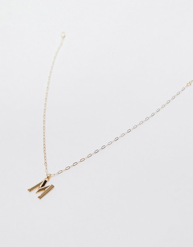Accessories by Topshop Welcome to the next phase of Topshop Link chain 'M' pendant Adjustable length Lobster clasp Sold by Asos