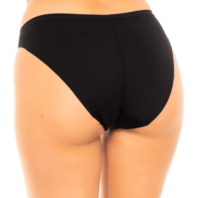 Onzichtbare panty Janira.
 Bijpassende elastische tailleband.
 Merkdetail gedrukt op de bovenkant.
 Extreem zachte en elastische stof.
 Het drukt of plakt niet, totaal onzichtbaar.
 Bijpassende binnenvoering.
 Naden in toon zichtbaar.
 Samenstelling: 80% Katoen, 20% Elastaan
 Onderhoud:
Wassen op maximaal 30º.
 - Geen bleekmiddel gebruiken.
 - Niet in de droger.
 - Niet strijken.
 - Niet chemisch reinigen.