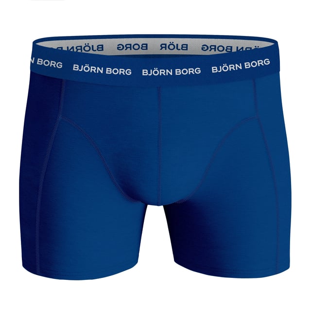 Björn Borg - Men’s 5 Pack Luxury Cotton Stretch BoxersIf you're looking to add a touch of luxury to your daily routine, look no further than these Björn Borg Men's Boxers. Made from soft cotton fibres, these boxers are the perfect everyday essential. The cotton blend is engineered to be as comfortable as it is durable, so you can wear them time and time again without worrying about fading or sagging. The soft elastic waistband gives you a secure fit and the mid-rise design means they're perfect for everyday wear.They have a comfort stretch fit and great value for money, so you can feel good about investing in yourself. The stretch fabric is designed to provide a snug fit that helps prevent any chafing or irritation.These boxers are perfect for both work and play, making them an ideal choice for topping up that underwear drawer. They come in 4 different colour/style options which are: All Black, Black & White Waistband, Solid Colours & Coloured Waistband.These boxers are made from: 95% Cotton, 5% Elastane and come in 4 sizes: Small, Medium, Large & X-Large. They come in 5 pairs per pack, making them great value for money and they are Machine Washable.Extra Product DetailsBjörn Borg Men’s BoxersSoft Cotton Fibres5 Pairs Per PackComfort Stretch FItGreat Value For MoneyMedium Leg LengthMid Waist RiseSoft Elasticated WaistbandAn Everyday Essential4 Colour Options95% Cotton 5% ElastaneAvailable in: S, M, L & XLMachine Washable