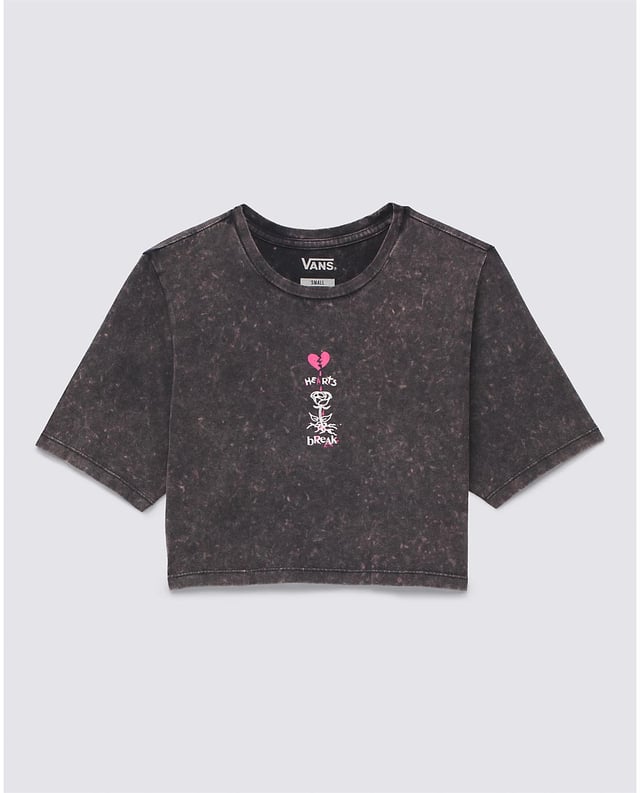 The Heartbreaker Crew Crop T-Shirt is a short sleeve cropped crewneck tee with the Vans logo and features an allover gravel wash and a graphic print of a broken heart and flower on the front. 100% Cotton fabric   Short sleeve crop top crew neck T-shirt   Sceenprinted graphic with puff ink   Gravel wash   Model wearing size Small