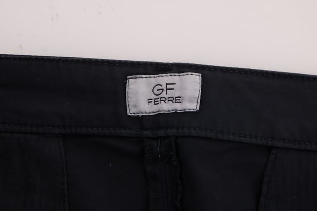 Brand: GF Ferre
  Color: Blue
  Fit: Straight fit
  Pockets: Two front pockets and two back pockets
  Closure: Zipper fly closure
  Details: Logo details
  Material: 97% Cotton 3% Elastane
Material: 97% Cotton 3% Elastane