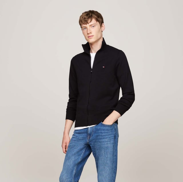Zip sweater from Tommy Hilfiger. Step up your wardrobe game with this stylish and comfortable zip sweater.- Organic cotton blend.- Small-discreet logo.- Regular fit.- Main composition: 81% Organic Cotton, 19% Polyester.- Sustainability Certification.- Organic Content Standard.- Machine Washable at 30°C.- Tumble dry gentle cycle.- Wash and dry inside out. Ref: MW0MW22747BDS.