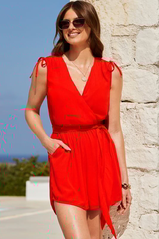 Don't pack without it
Breezy crinkle fabric and comfy relaxed fit
Oh-so-flattering wrap front and waist-cinching belt
Elevated with a ruched shoulder detail
Slip over swimwear for beach-side lunches
Add glamour with espadrille wedges