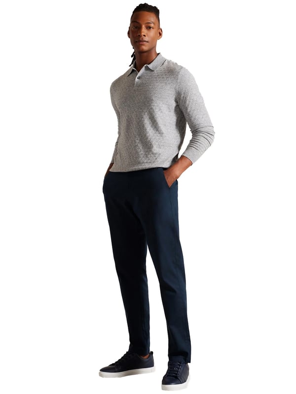 <span style="color: rgb(48, 55, 62); font-family: "IBM Plex Sans", sans-serif; font-size: 14px; white-space-collapse: preserve;">Unmatched in versatility and enduring in style, The Morar Polo is an essential in any wardrobe, effortlessly combining comfort and sophistication. Whether dressing up for a weekend affair or striving for a laid-back yet polished appearance, this polo offers the perfect solution. Boasting a timeless design with its long sleeves, diamond T stitch and classic collar, this knitted shirt is crafted from a luxurious wool blend and fastened with buttons.</span>