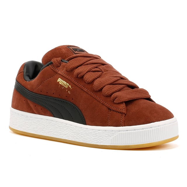 Sneakers featuring a premium suede upper for a sleek and stylish look. Debossed and foil-printed PUMA branding on the quarter panel adds a touch of sophistication. Finished with a durable rubber sole for reliable traction and comfort.