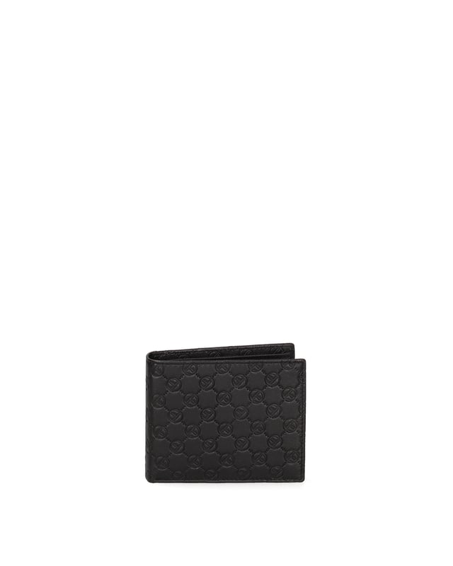 Cartera de hombre. El cierre está ausente. Los bolsillos internos son tarjeteros. Los bolsillos externos están ausentes. Falta la correa para el hombro. Falta el mango. Hay un compartimento interno. El material exterior es 100% Piel Auténtica. Internamente no está forrado. Medidas: 11x9x2 cm. Producto de moda