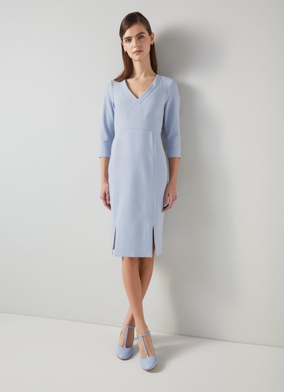 Beautifully tailored, totally timeless and kind to our planet, the new Sky shift is designed with dressy days in mind, because we all need that one dress that can do it all. Thoughtfully-made in Europe from a pale blue LENZING™ ECOVERO™ viscose* blend crepe, it's a shapely shift with a deep V-neck, three-quarter sleeves with flared cuffs, a nipped waist and a pencil skirt with slit detail. Wear it with courts and a tote for the office or with heels and a clutch for the fancier moments in your spring diary. 

*More about the fabric
LENZING™ ECOVERO™ viscose uses up to 50% less emissions and 50% less water than standard viscose. This fibre relies on wood pulp, and is crafted from sustaibly maged tree species such as beech, spruce and eucalyptus.