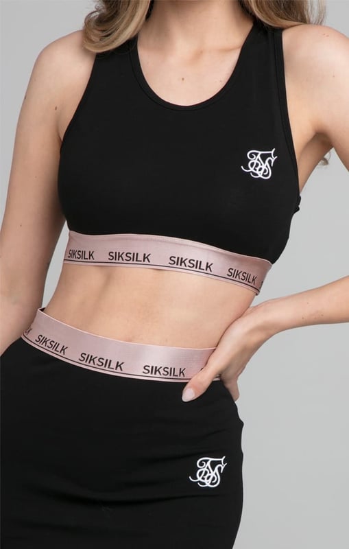 inchSikSilk Roseate Bralette - BlackLuxury vibes in our Roseate range that uses rose gold taping.Matching items availableBodycon racerback fitSoft touch fabricRose gold satin effect branded tapeEmbroidered logoMachine wash95% Cotton 5% ElastaneModel 5ft 10in and wears a size Small inch