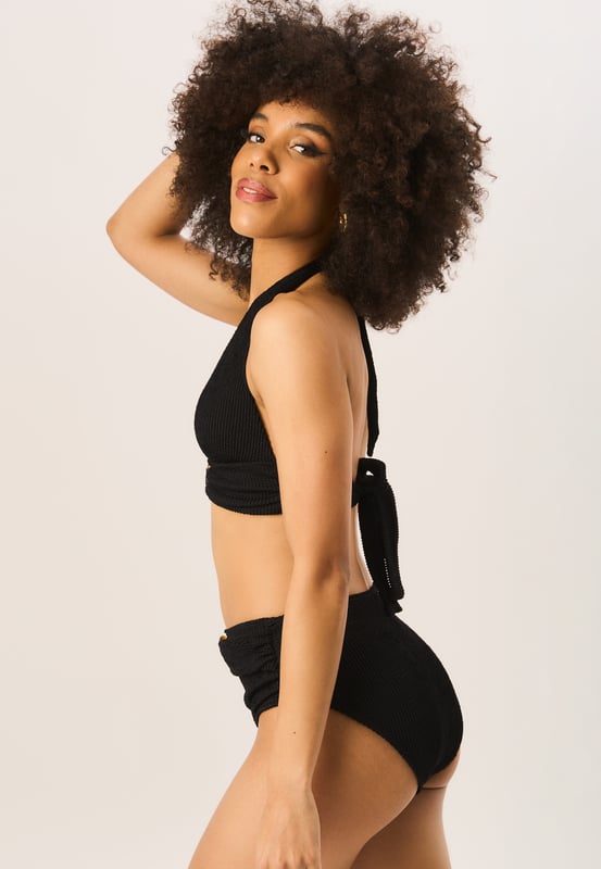 These Textured High Waisted Bottoms are a must-have for any fashion-forward wardrobe. The ring belt detail adds a unique touch to these already chic bottoms. Stay comfortable and stylish all day long with these trendy high waisted bottoms.