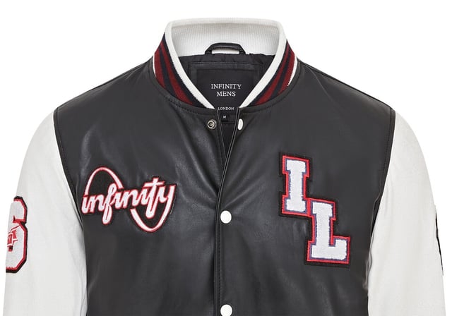 Introducing the Men's Baseball Leather Jacket, a perfect blend of classic varsity style and modern craftsmanship. This letterman bomber jacket features contrasting sleeves and a striped knit ribbed collar, waistband, and cuffs for a timeless athletic look. The press studs front closure and embroidered brand logo patches on the chest and sleeves add a touch of authenticity and flair. Designed with practicality in mind, it includes two jet pockets at the waist and two inside welt pockets for your essentials. The panelling to the back of the jacket ensures a tailored fit and superior comfort.

Contrasting sleeves for a stylish look
Striped knit ribbed collar, waistband, and cuffs for a classic finish
Press studs front closure for easy wear
Embroidered brand logo patches on the chest and sleeves for added detail
Two jet pockets at the waist and two inside welt pockets for convenience