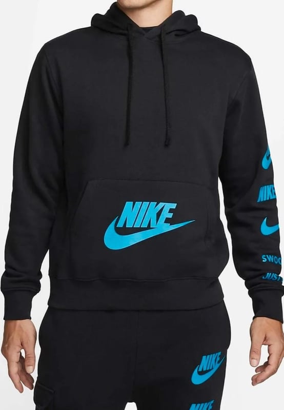 Nike Sportswear Standard Issue Hooded Tracksuit in Black Nike Men's Standard Issue Pullover Tracksuit set. - -. Soft and Warm comfortable Adjustable Drawcord Hood comes with Kangaroo Pouch Pocket, Logo Patch Pouch Pocket and multiple logos on the Sleeve, Elasticated Ribbed Cuffs & Hem Pullover Style hoodie. - -. Drawstring Closure Jogger, Elastic Cuffs and Drawcord Waistband for a Secure fit, the regular fit is Slim at the Hip and Relaxed through the Leg, 2 Side Pockets and Single cargo pocket design. - -. 80% Cotton, 20% Polyester. - -. Machine washable.