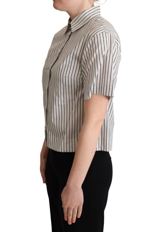 A estrenar con etiquetas.
  Polo de algodon 100% autentico de Dolce & Gabbana.
  Diseno de rayas en blanco y negro.
  Cuello tapeta de botones en la parte delantera y mangas cortas.
  Detalles del logotipo.
  Fabricado en Italia.