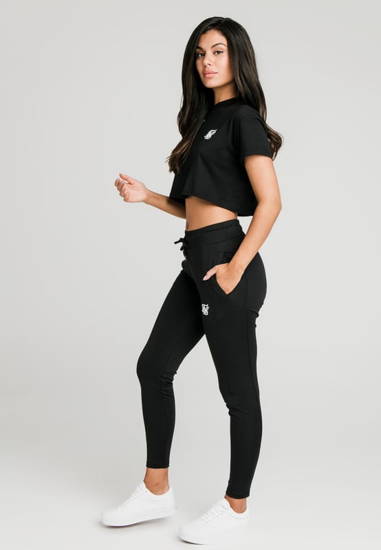 inchThe Black Essential Retro Box Fit Crop TShirt in Black is a new addition to the Women's SS-20 Collection. Pair this tee with any of the SikSilk Women's Zonal Track Pants to create a fashionable look!Breathable cotton fabricCrew neckEmbroidered SikSilk logoCropped lengthMachine wash100% Cotton inch