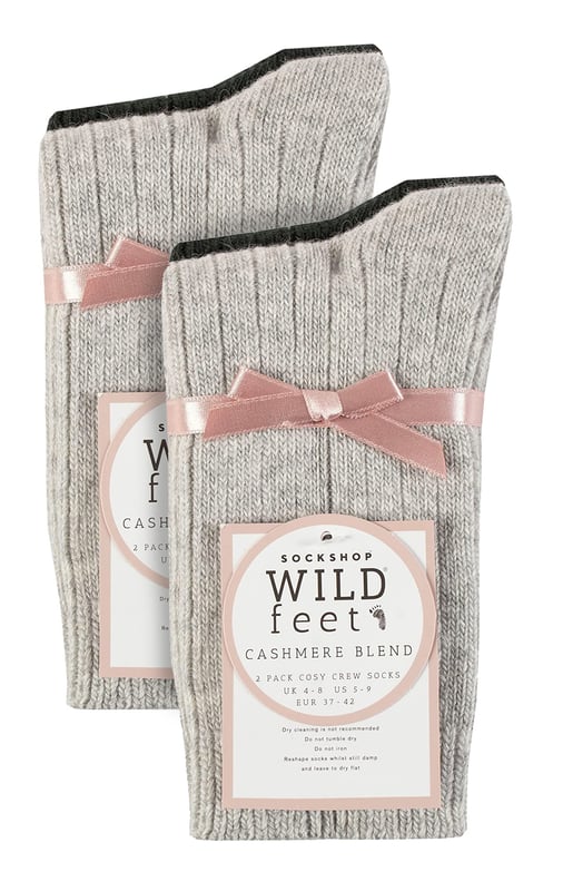 These ladies’ Wildfeet Cashmere Socks are the socks of luxury and comfort. Made from a blend of natural wool, viscose, and cashmere, they are designed to provide warmth and cosiness throughout the day, whether you're running errands or relaxing at home. These socks offer the perfect balance of luxury and practicality with a blend of wool, viscose, and cashmere. The soft and comfortable material provides warmth and insulation to keep your feet cosy in the cold weather while also being breathable and moisture-wicking. The combination of fibres makes these socks more durable, ensuring long-lasting wear, while the ribbed leg enhances comfort. The crew length and medium gauge thickness make them a good choice for any leisure shoes or boots, adding a touch of comfort to any outfit. These 4 pairs of Wildfeet Cashmere Socks come in 2 gift boxes and attractively wrapped with a satin ribbon bow, which makes them ideal for gifting to friends or family. Maybe even a last minute Christmas present or stocking fillers? Wild Feet is a range of socks featuring cool designs, bold colours and quirky catchphrases - from pugs and penguins, to lions and llamas! Choose from a range of styles for men and ladies, from dress to trainer socks. There are even some sporty styles available! There are 14 colours to choose from. They come in one size Ladies 4-8 UK, are made from 37% Wool, 27% Viscose, 24% Polyamide, 11% Cashmere, 1% Elastane and are machine washable.