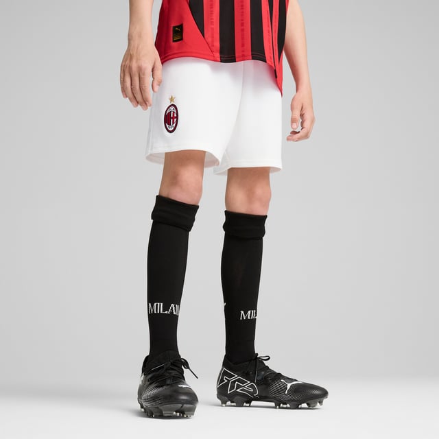 PRODUCT STORY: Hit the pitch like AC Milan's finest in these football shorts. They're made from sweat-wicking material to keep you cool in the tensest moments of the game and are finished with the team's famous crest on the leg. FEATURES & BENEFITS: dryCELL: Performance technology designed to wick moisture from the body and keep you free of sweat during exercise; As part of the RE:FIBRE program, this garment is made of at least 95% recycled material from textile waste and other used materials. DETAILS: Regular fit; 170 gsm, Jacquard; Medium rise; Official team branding; PUMA branding details; PUMA Youth: Recommended for older kids between 8 and 16 years.  Our model is 148 cm tall and is wearing size 152 RUS.