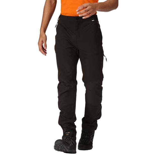Material: Elastane, Polyester. Fabric: Stretch. Design: Logo. Fabric Technology: Isoflex, Water Repellent, Wind Resistant. Belt Loops, Side Zip Ankles, Ventilation Panels. Pockets: 2 Side Pockets, 1 Back Pocket, 1 Thigh Pocket, Zip. Waistline: Part Elasticated. Weatherproof.