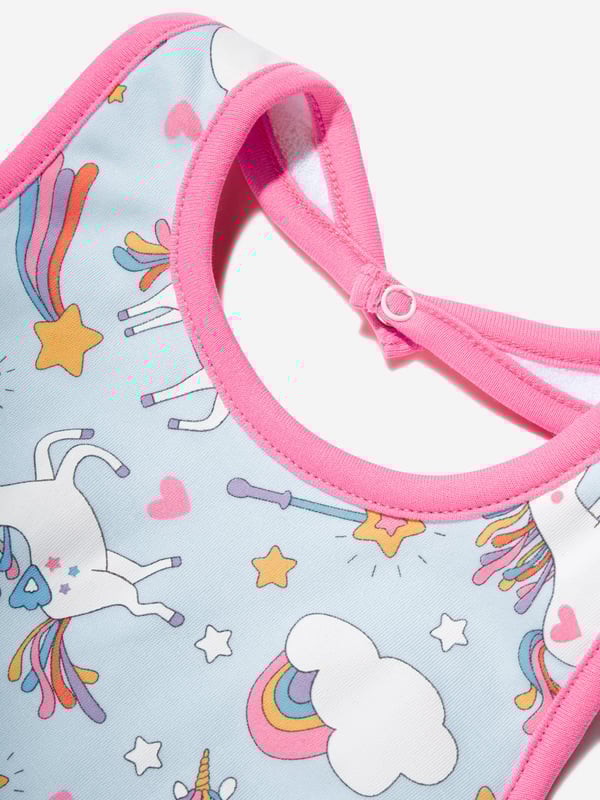 Magnolia Baby incorporate fine detailing and impeccable construction into their beautiful aesthetics. This baby girls pink bib is reflective of the label's passion for geometric abstracts. Crafted in beautiful pink trim unicorn patterning, she will look effortlessly adorable.  100% Pima Cotton  Press-Stud Fastenings  Towelled Fleece On Back