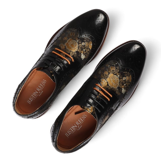 Add a unique touch to your formal wardrobe with the Ross Men's Floral Print Leather Brogue Shoes. Crafted from 100% premium leather, these brogues combine style, durability, and comfort. Featuring classic brogue detailing with decorative patterns, they bring elegance and sophistication to any look.

Unique Floral Print for a bold, stylish statement
Premium Leather for durability and luxury
Classic Brogue Detailing for timeless appeal
Lace-Up Design for an adjustable fit