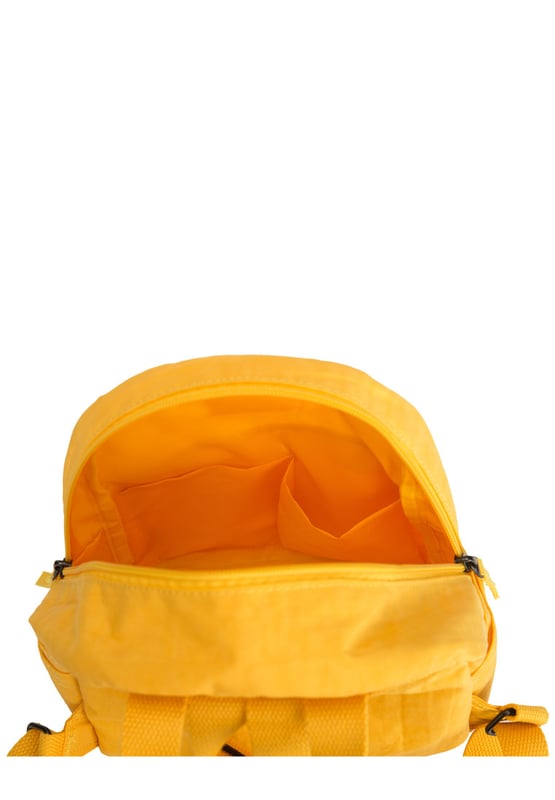 A small-sized backpack made in crushed nylon fabric. It's fun and stylish design is perfectly sized to hold all your daily objects and the adjustable shoulder strap means you can alter the length to suit you. Features: , Artsac rubberised patch logo, Zip top opening, Twin strap backpack, Adjustable shoulder straps, External front zip pocket, External slip pockets, Internal zip and slip pockets, Splash proof nylon fabric Style Ref: 50293 MUSTARD