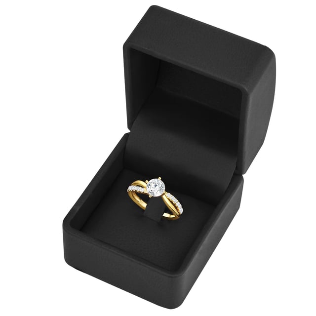Are you looking for a special engagement ring? This solitaire ring of the 1934 manufacture is a guarantee for a perfect application. The focus is on a striking solitaire from Zirconia on a two -part ring rail, which is partly occupied by zirconia crystals. The glittering of the precise brilliant cut can hardly be distinguished from the real diamond and makes the ring a glamorous symbol of love. The curved ring rail is made of 925 sterling silver and refined with warm shimmering yellow gold. A special ring that remains a favorite accessory even after the wedding.