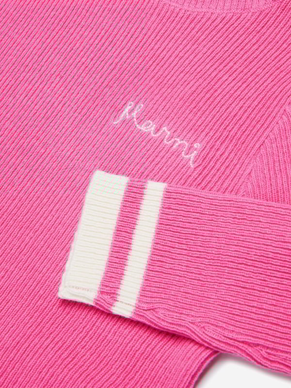 Introducing the Marni Girls Knitted Roll Neck Jumper in Pink, a chic addition to the AW2024 collection. Impeccably tailored for the fashionable young girl, this jumper spells elegance and comfort. Key features include:‚ Luxurious Feel: Crafted with the finest yarns for a soft, enveloping feel.‚ Stylish Comfort: Roll neck design keeps warm while ensuring a stylish look.‚ Vibrant Pink Shade: Brightens any outfit with a playful touch.Elevate your girl's wardrobe this season with Marni's exclusive design!
