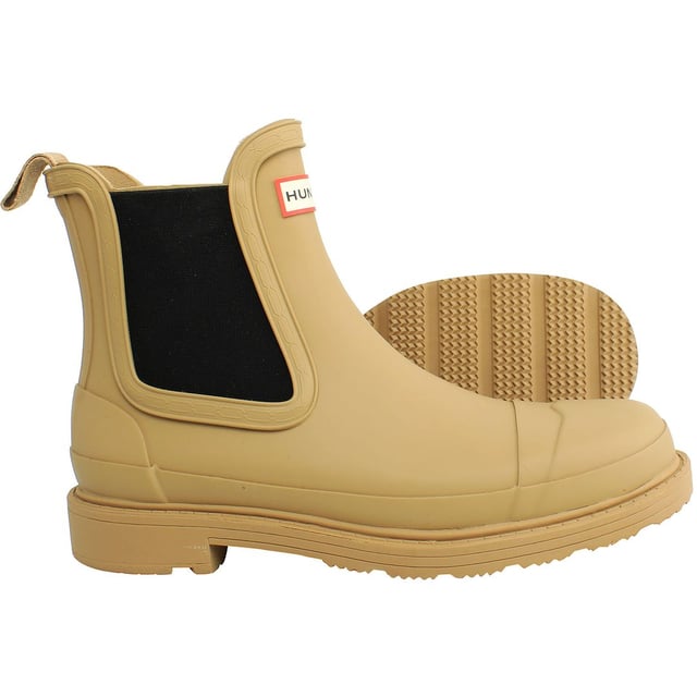 Hunter Commando Women's Brown Chelsea Boots â€“ where rugged sophistication meets urban style. These boots are crafted to seamlessly blend fashion with functionality, providing a versatile and durable footwear option for the modern woman. Here's a detailed description highlighting the key features of these boots:

 Rugged Elegance:  The Hunter Commando Chelsea Boots exude rugged elegance with their brown hue and timeless Chelsea boot silhouette. This versatile color adds a touch of warmth and complements a variety of outfits, making them a wardrobe staple for any season.

 Durable Construction:   Built for the demands of both city streets and outdoor excursions, these boots feature a durable construction that stands up to daily wear. The high-quality materials ensure longevity, making them a reliable choice for various activities and environments.

 Chelsea Boot Convenience:   The slip-on Chelsea boot design offers effortless style and convenience. With elastic side panels and a pull tab, these boots are easy to put on and take off, allowing you to transition seamlessly from casual outings to more adventurous pursuits.

 Comfortable Interior:   Experience all-day comfort with the cushioned insole and breathable lining of these boots. Whether you're navigating city sidewalks or exploring nature trails, the interior design ensures a comfortable and supportive fit for extended wear.

 Versatile Styling:   The rich brown color and classic Chelsea boot design make these boots incredibly versatile. Pair them with jeans for a casual look or incorporate them into your work attire for a touch of rugged sophistication. The Commando boots effortlessly elevate your style in any setting.

 Grip and Traction:   The rugged outsole is designed to provide excellent grip and traction on various surfaces. Whether you're walking on wet pavement or uneven terrain, these boots offer stability and prevent slips, allowing you to move confidently through your day.

 Weather-Resistant Finish:   Navigate changing weather conditions with ease. The weather-resistant finish on these boots ensures they can handle light rain or unexpected drizzles, keeping your feet protected and stylish regardless of the forecast.

Step out in style and confidence with the Hunter Commando Women's Brown Chelsea Boots â€“ a perfect balance of fashion-forward design and practical functionality. From city streets to outdoor adventures, these boots are your go-to choice for a seamless blend of elegance and durability.