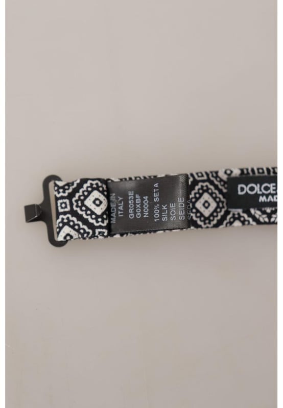 Stunning Dolce & Gabbana silk bow tie
  Brand new with tags
  Color: Black and White
  Model: Tied
  Material: 100% Silk
  Adjustable length neck strap
  One size
  Made in Italy
  Width: 7cm
Material: 100% Silk