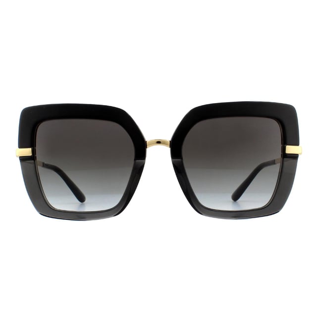 Dolce & Gabbana Sunglasses DG4373 32468G Top Black on Transparent Grey Gradient are a striking square style frame with the iconic Print Family Theme. DG4373 have a half print design with each half separated by metal detailing that follows around to the temples with Dolce & Gabbana engravings.