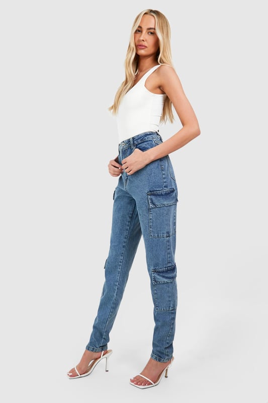 Slim fit cargo jeans designed for taller frames
        Multiple utility pockets for added functionality
        High-rise waist for a flattering silhouette
        Tapered leg design for a modern look
        Versatile denim fabric suitable for various casual occasions
    
    Embrace the fusion of style and practicality with these Tall Basics Slim Cargo Jeans from Boohoo. Perfect for the fashion-forward woman who values both trend and comfort, these jeans offer a contemporary twist on a classic design. The slim fit accentuates your curves while the cargo pockets add an edgy, utilitarian flair. Style them with a crisp white tank top and strappy heels for a chic daytime look, or pair with a slouchy jumper and trainers for a more relaxed vibe. These jeans are ideal for casual outings, from coffee dates to weekend shopping trips. Their versatility makes them a wardrobe staple that can be dressed up or down to suit any casual occasion. The denim fabric ensures durability and ease of care, making these jeans a practical choice for the busy, style-conscious woman.