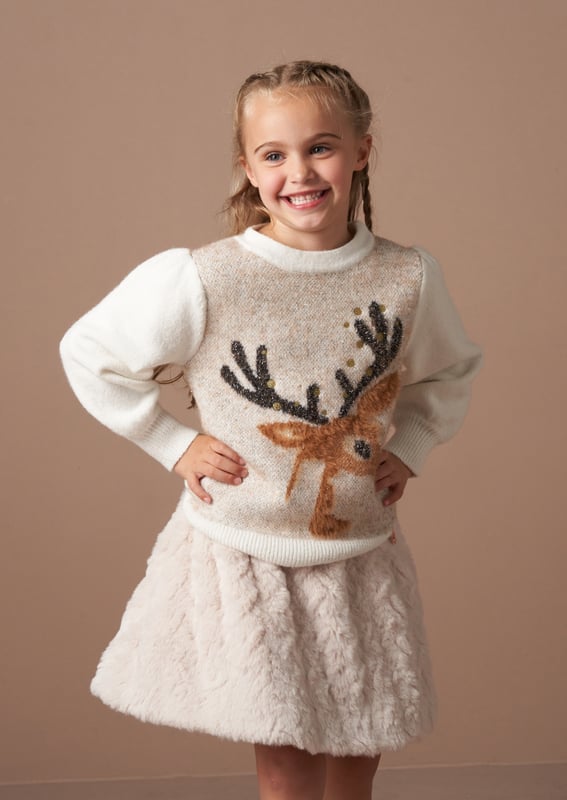 We love this Winter knit deer-ly. Knitted from the softest yarns and scattered with metallic highlights. it features a beautiful deer motif perfect for the festive season. It will certainly make your heart grow fawn-der!.