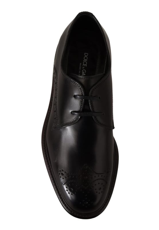 Dolce & Gabbana Men's Black Leather Dress Formal Derby Shoes Model: Dress derby shoes
Color: Black
Material: 100% Calfskin Leather
Rubber sole
Logo details
Made in Italy
Very exclusive and high craftsmanship