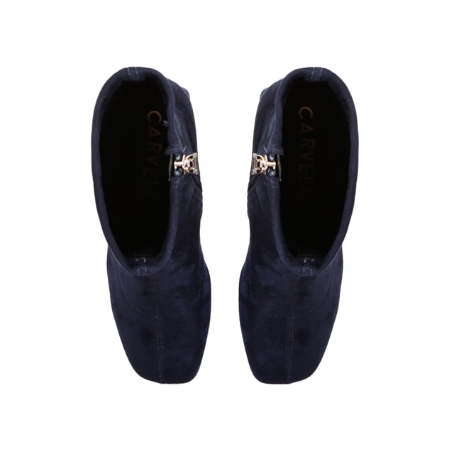 The Quant Ankle Boot is crafted from a navy microsuede. This boot has a higher ankle and block style heel.