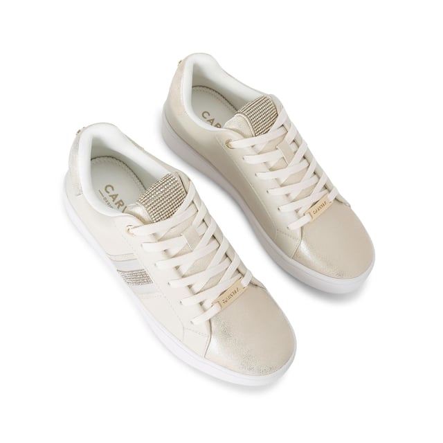 This Carvela Rapid trainer features a gold upper with metallic toe and heel panels. The tongue is embellished with rose gold crystals. The front laces up with gold tone branding details.