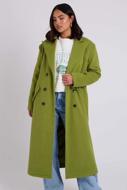 Model is 5'6 and wears a size 8, button fastening, long length, pockets, cosy fit