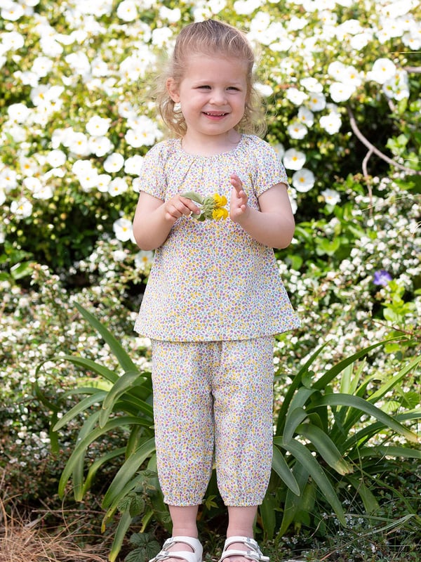 100% organic cotton | Proud to be certified to the Global Organic Textile Standard (GOTS) | Little bud all-over print | Double layer muslin fabric | Short sleeved | Elasticated neckline and cuffs | Made in India | Machine washable at 40 degrees, or at 30 degrees to be kinder to the planet