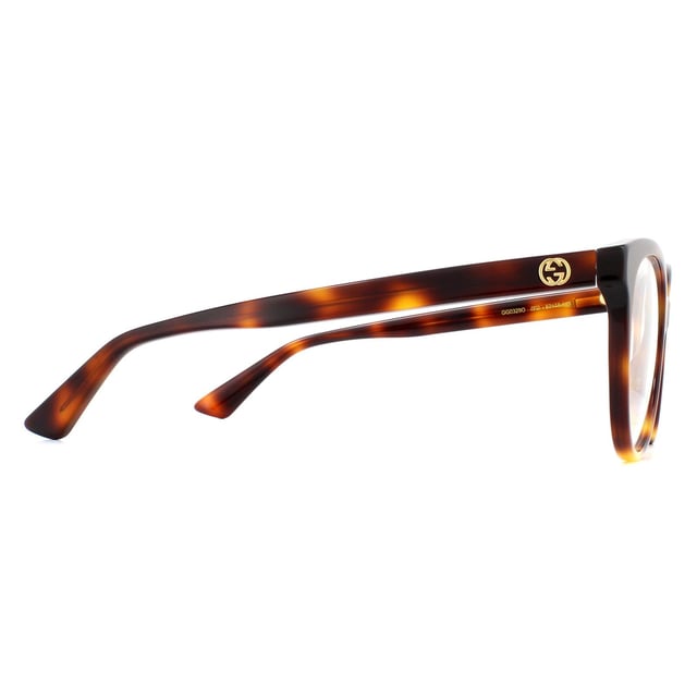 Gucci Glasses Frames GG0329O 002 Light Havana Women are an oversized round style with upswept corners for a subtle cat eye finish. The thick acetate frame is embellished with interlocking GG logos on the temples.
