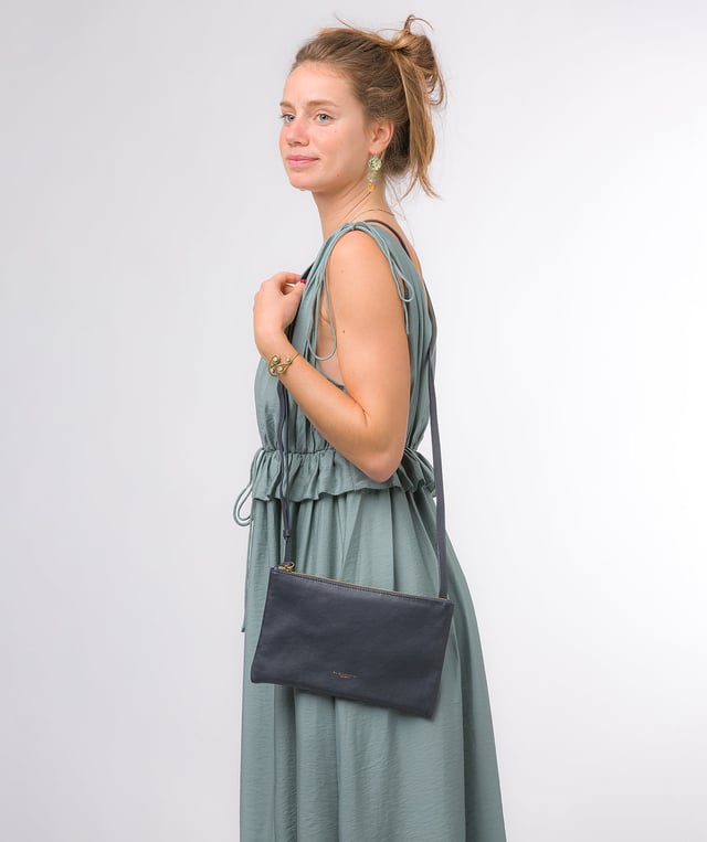 Crafted from high-quality Nappa leather, the 'Anya' cross body bag from Pure Luxuries London's Marylebone Collection is a must-have thanks to the super soft-to-the-touch feel and finish. A stylish zip-over top secures the central compartment which is lined with 100% cotton for a flawless look. Additional storage is provided by three card slots and a slip pocket, perfect for all your essentials. This accessory is adorned with a slim and adjustable strap with a maximum drop length of 65cm and complemented by eye-catching gold-coloured metal fittings and zips which give it an elegant look. The Pure Luxuries logo is embossed for an effortless and sophisticated finishing touch.