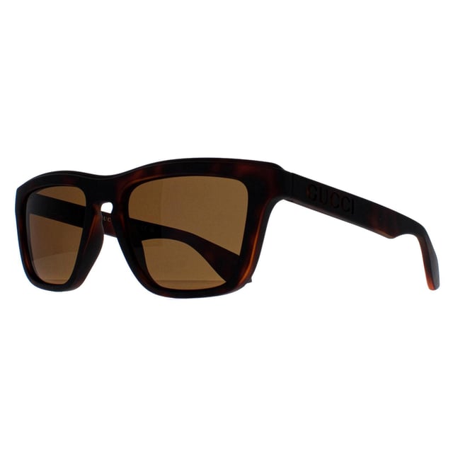 Gucci Rectangle Unisex Havana Brown GG1571S  Sunglasses showcase a contemporary rectangle design that seamlessly merges sophistication with bold fashion. The sleek and refined frame, adorned with the iconic Gucci logo detailing on the temples, exudes luxury at every glance. Precision engineered from premium materials, these shades prioritize comfort without compromising on durability, making them the perfect accessory for both fashion aficionados and trendsetters. Whether you're lounging poolside or striding through the city streets, the Gucci sunglasses are a testament to refined taste and unparalleled craftsmanship.