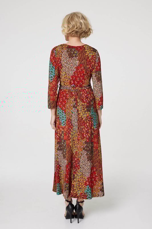 Every occasion collection needs an refreshing burst of colour like this peacock print wrap front dress. With a deep V-neck, a faux wrap front, a self-tie removable belt, 3/4 slim fit sleeves, an A-line skirt and a non-iron jersey stretch fabric.