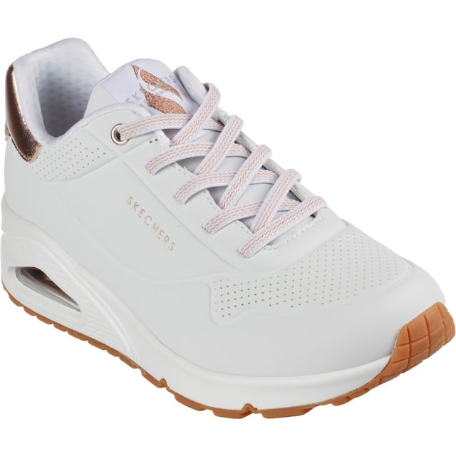 Slip-on a classic style in comfort wearing Skechers Street Uno - Shimmer Away. This fashion sneaker features a synthetic durabuck upper with a metallic trim, stretch laces, Skechers Air-Cooled Memory Foam insole and Skech-Air visible airbag midsole.