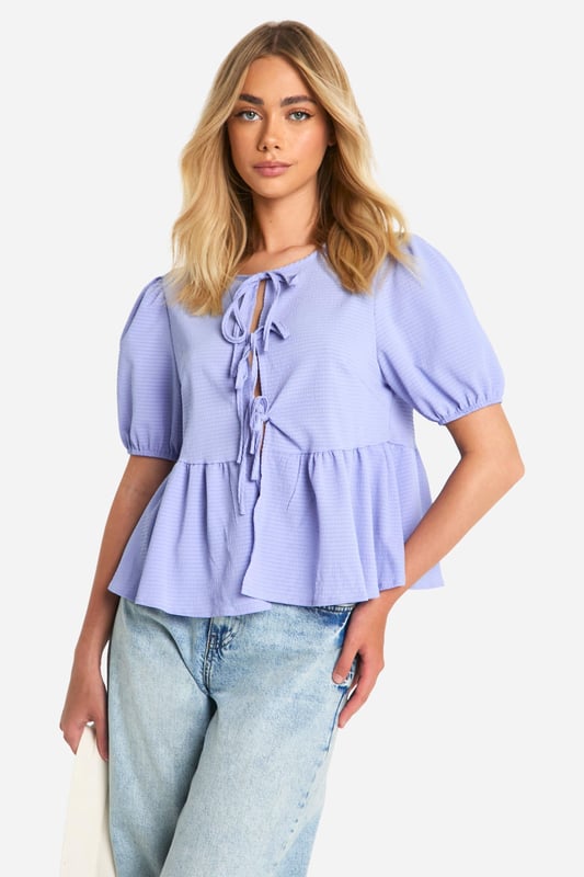 Look hot in this pretty smock top, fresh from our latest arrivals. Made from gathered fabric that's designed to stretch, a smock top is skin tight at the top and falls loosely for a flattering fit on all shapes and sizes. Cut to a practical shape, effortless style is made easier with a smocked blouse or top, the perfect throw-on piece you can team with jeans for everyday wear. From laidback crew necks to criss-cross backs, our latest edit is full of fun laid back pieces - choose yours today.Style: Smock TopLength: RegularSleeve Length: Long Sleeve