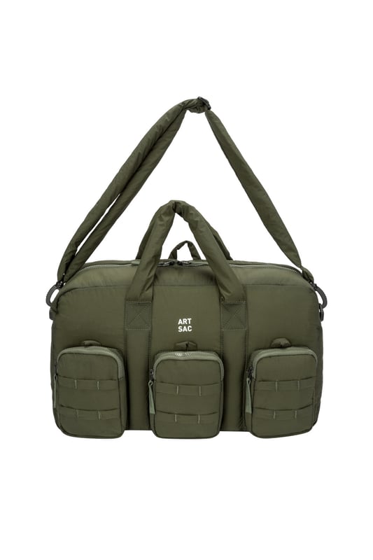 The ultimate carry companion, perfect for every day wear. Featuring a full-length zip top opening and 3 large side pockets, the Harring Padded Triple Holdall is spacious enough for any short or long trip away. Features a detatchable padded shoulder strap. Features: , Padded lightweight nylon, Water resistant, 15 inch padded laptop sleeve - Fits Apple MacBook Pro 16 inch, Grab handle carry straps, Removable padded shoulder strap allowing crossbody styling, Zip top opening to main compartment, ARTSAC screen printed logo, Triple front zip pocket with loops, Internal zip pocket, 2 Internal mobile phone slip pockets - Fits normal and plus size smart phones, 3 Internal pen slip pockets, External rear zip pocket Style Ref: 52010 KHAKI