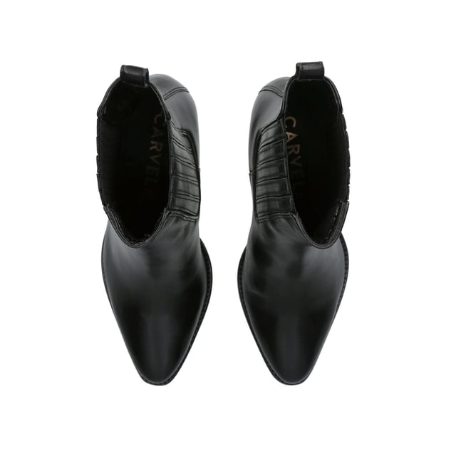 The Carvela Rodeo is a cowboy style boot featuring a black leather upper with elasticated ankle for comfort when slipping on. The nail of the ankle features a small pull tab and Icon C stud. Heel height: 70mm