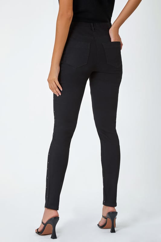 Diamante Embellished Stretch Jegging from Roman. Score some serious style points this season by adding denim with a difference! Cut from a stretch denim, these comfortable jeggings feature sparkling diamante embellishment that takes them to the next level. The bestselling shape features handy pockets, belt loops and an easy pull on silhouette. Wear with heeled boots for a glamorous Autumn Winter daytime style or dress them up for evening cocktails with heels and a blouse!