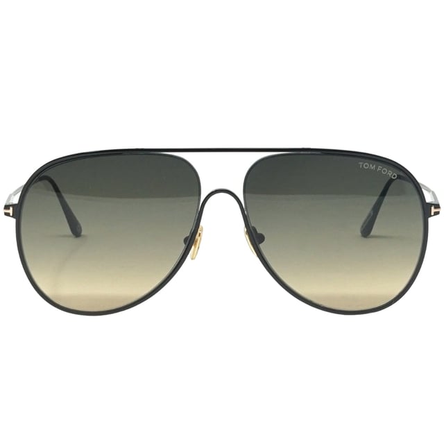 Tom Ford Alec FT0824 01B Black Sunglasses. A touch of fun for your summer days, but nothing too out of the ordinary for a Tom Ford collectible. Tom Ford Black Sunglass perfect for the summer.. Made In Italy, Tom Ford Black Sunglass, Lens Width = 62mm, Nose Bridge Width = 12mm, Arm Length = 140mm. Branded Sunglasses Case and Cleaning Cloth Included. 100% Protection Against UVA and UVB Sunlight and Conform to British Standard EN 1836:2005, Sunglasses, Sunglasses Case, Cleaning Cloth and Care Instructions all Included. Tom Ford FT0824 01B Sunglasses