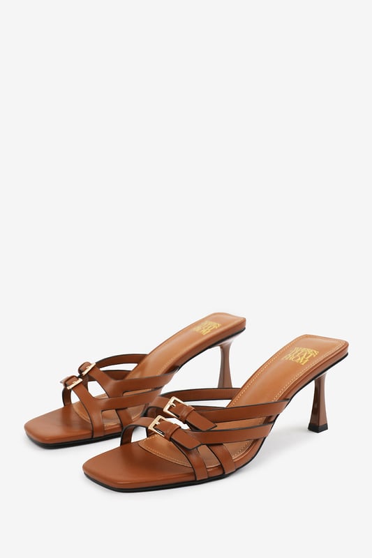 Wheres That From Womens 'Torigh' Cross Over Buckle Details Strap Heel Step up your style with these Torigh Cross Over Buckle Details Strap Heel. Perfect for casual outings or dressy events, these sandals combine modern elegance with lasting comfort, making them a must-have addition to your wardrobe.
Key Features:
Durable Construction: Crafted with high-quality faux leather, these sandals are designed to last. The sturdy heel and durable straps provide reliable support, ensuring they can withstand regular wear without compromising style.
Chic Design: The multi-strap design with subtle metallic accents exudes elegance and sophistication. The square toe and slender heel add a modern, fashion-forward touch that enhances their timeless appeal.
Comfortable Fit: Featuring a padded insole and a balanced heel height, these sandals provide all-day comfort without sacrificing style. The open design ensures breathability and ease of wear, making them perfect for any occasion.
Specifications:
o Material: High-quality faux leather
o Heel Type: Slender heel
o Closure: Slip-on design for convenience
Elevate your footwear collection with these Torigh Cross Over Buckle Details Strap Heel. Combining chic design, durable construction, and superior comfort, they are perfect for making a statement wherever you go!