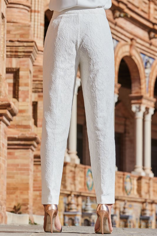 REASONS TO BUY:

Crafted from gorgeous white lace
Fully-lined for comfort and coverage
Chic tapered legs
There's a matching blazer too
The perfect alternative wedding look

Inside leg to fit: Short 29" | Regular 31" | Long 33"